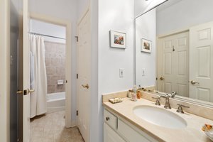 Bedroom 5 en-suite bath with large linen closet.