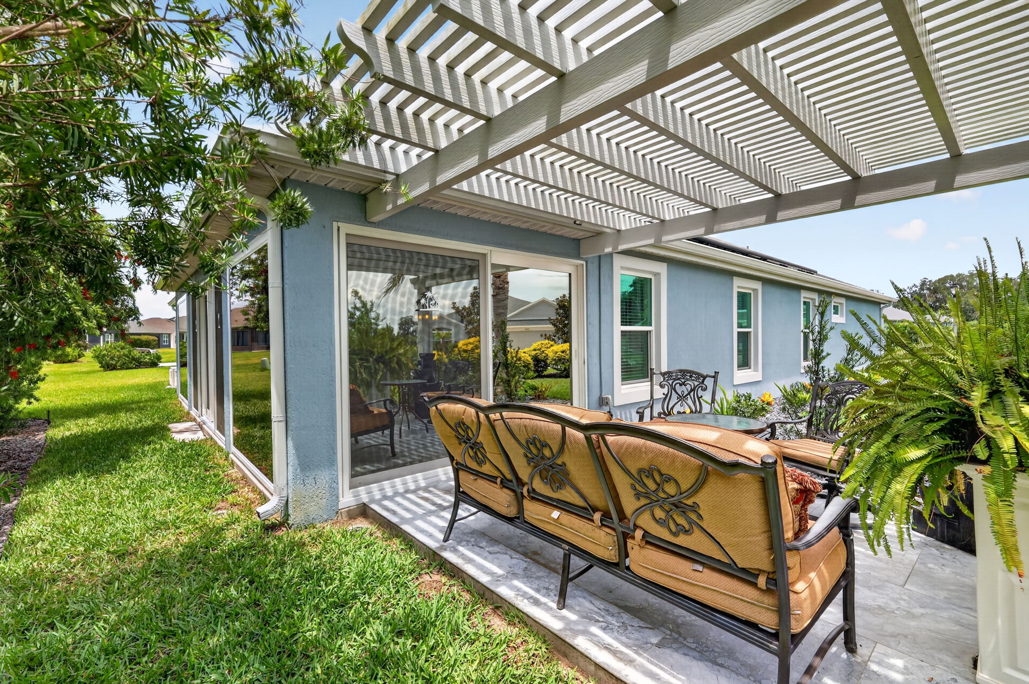 Side Patio with Waterfall and Pergola