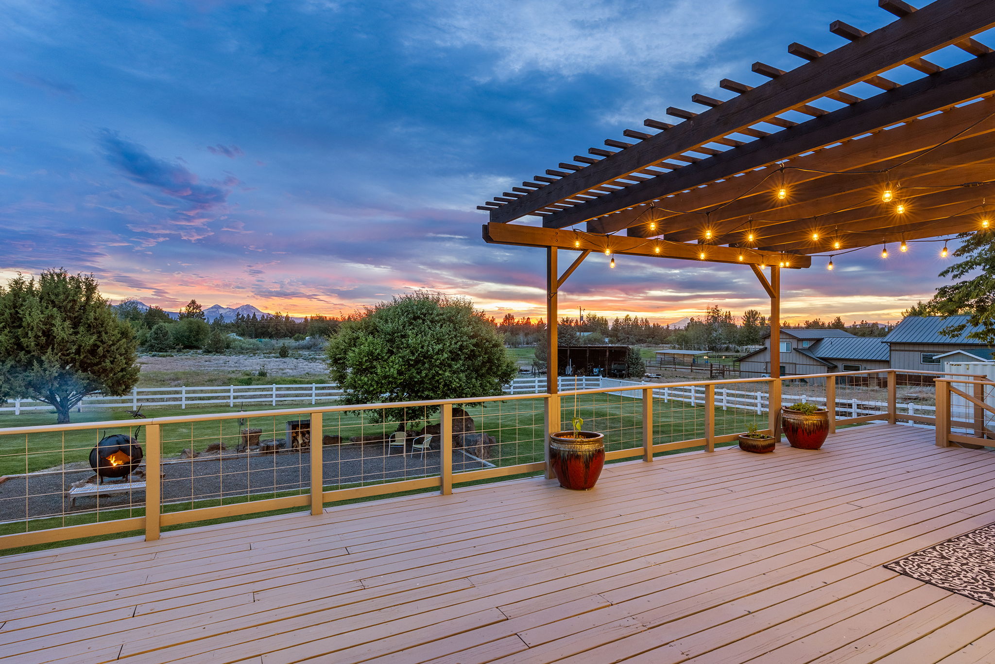 Enjoy an Evening on the Expansive Back Deck Watching Amazing Sunsets
