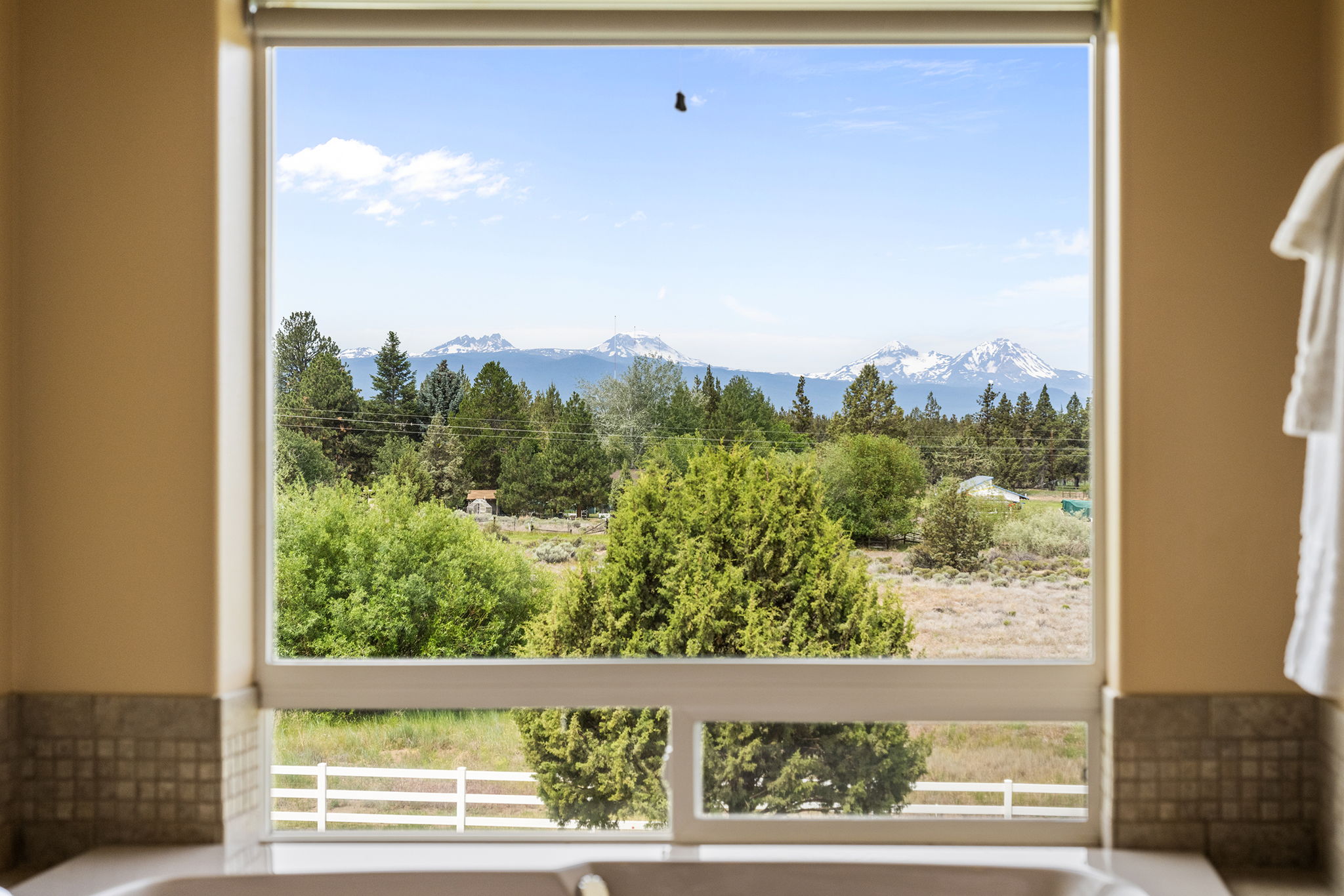 Expansive Cascade Mountain View from Main Level Primary Bathroom