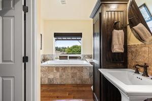 Main Floor Primary Bathroom with Cascade Mountain Views