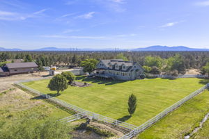 Beautiful Park-like Setting Framed by White Fencing