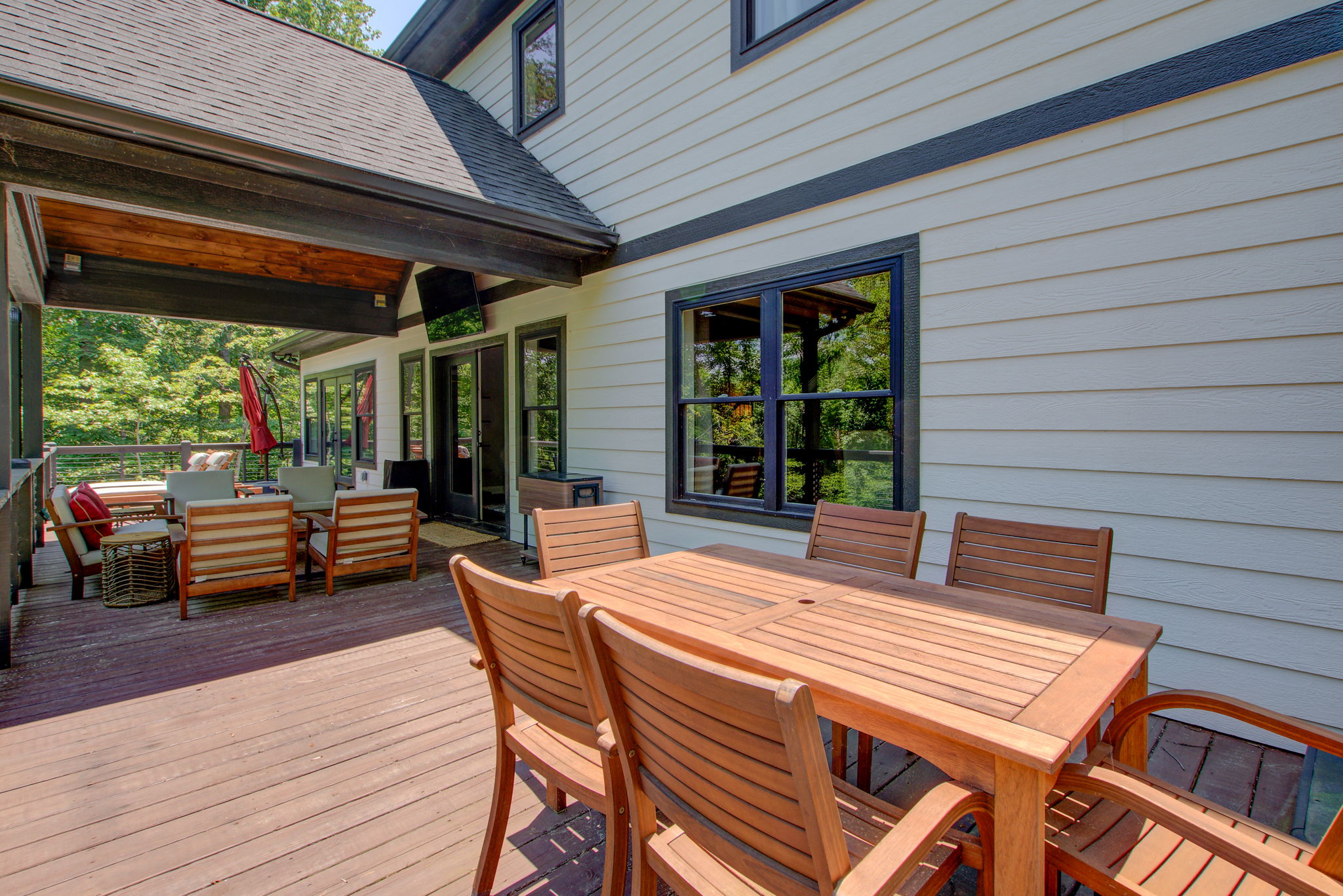 26 Exterior Deck Eating Area w Full Deck View