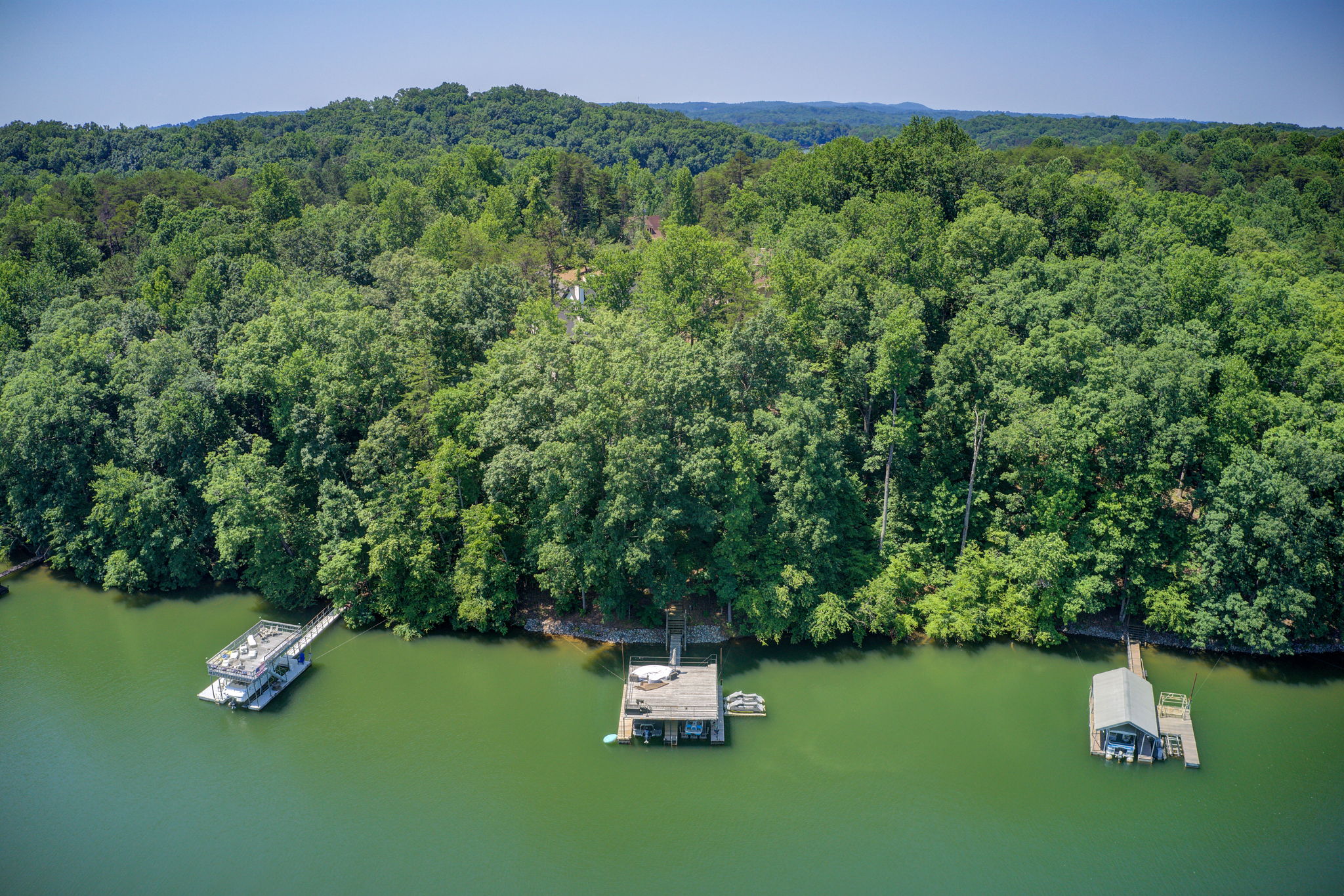 82 Aerial Exterior Boat Dock B w Lake Lanier + Horizon