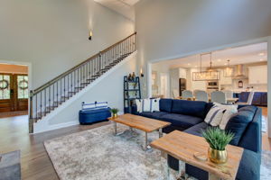 8 Living Room A w Foyer + Staircase Detail