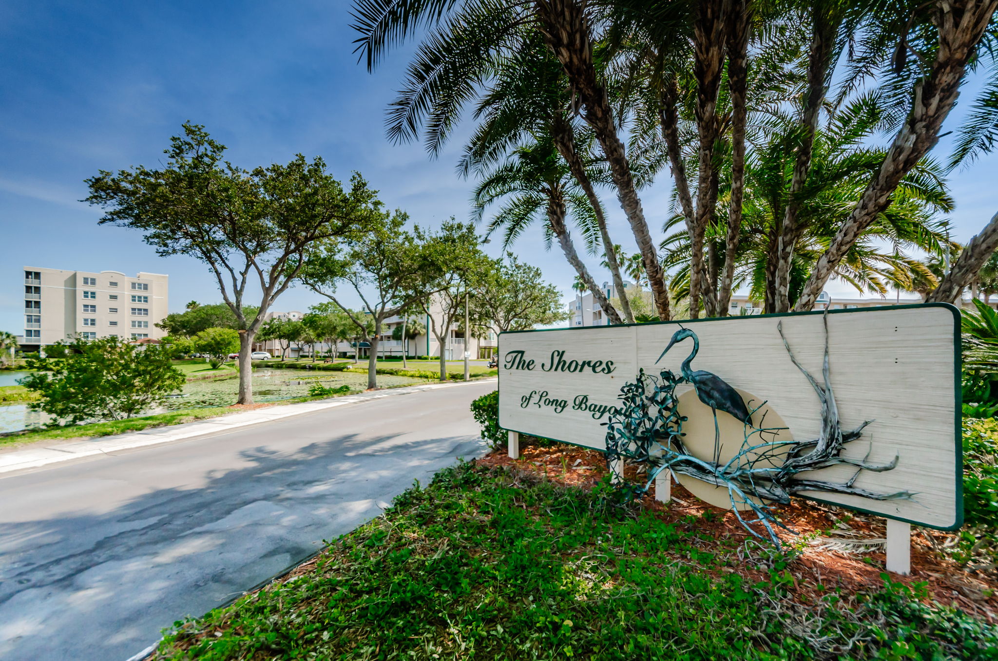 The Shores of Long Bayou Sign