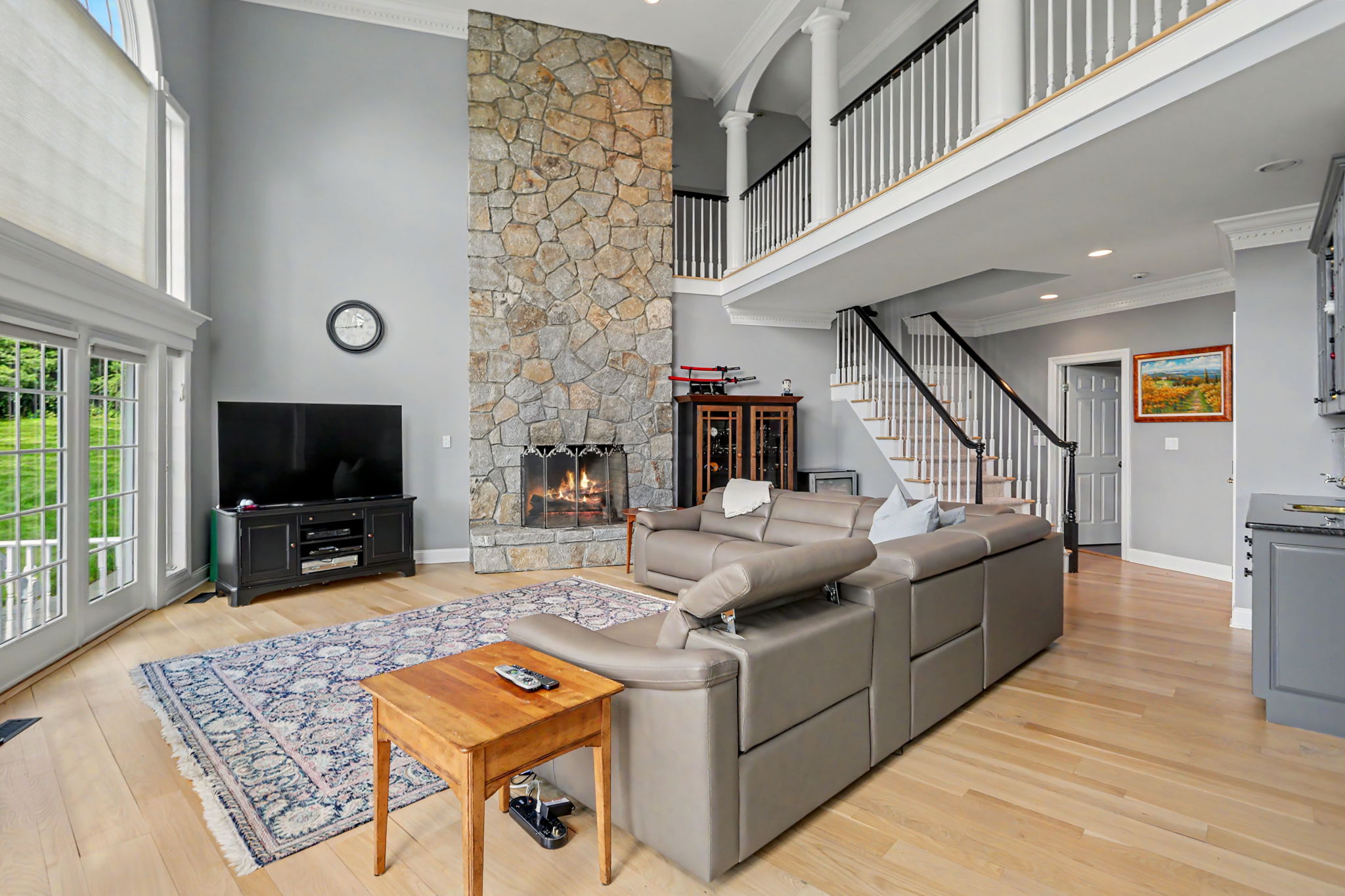 Family Room - Wet Bar on Right, Door to Laundry Room,  Hall to Garage, Stairs to Bonus Room