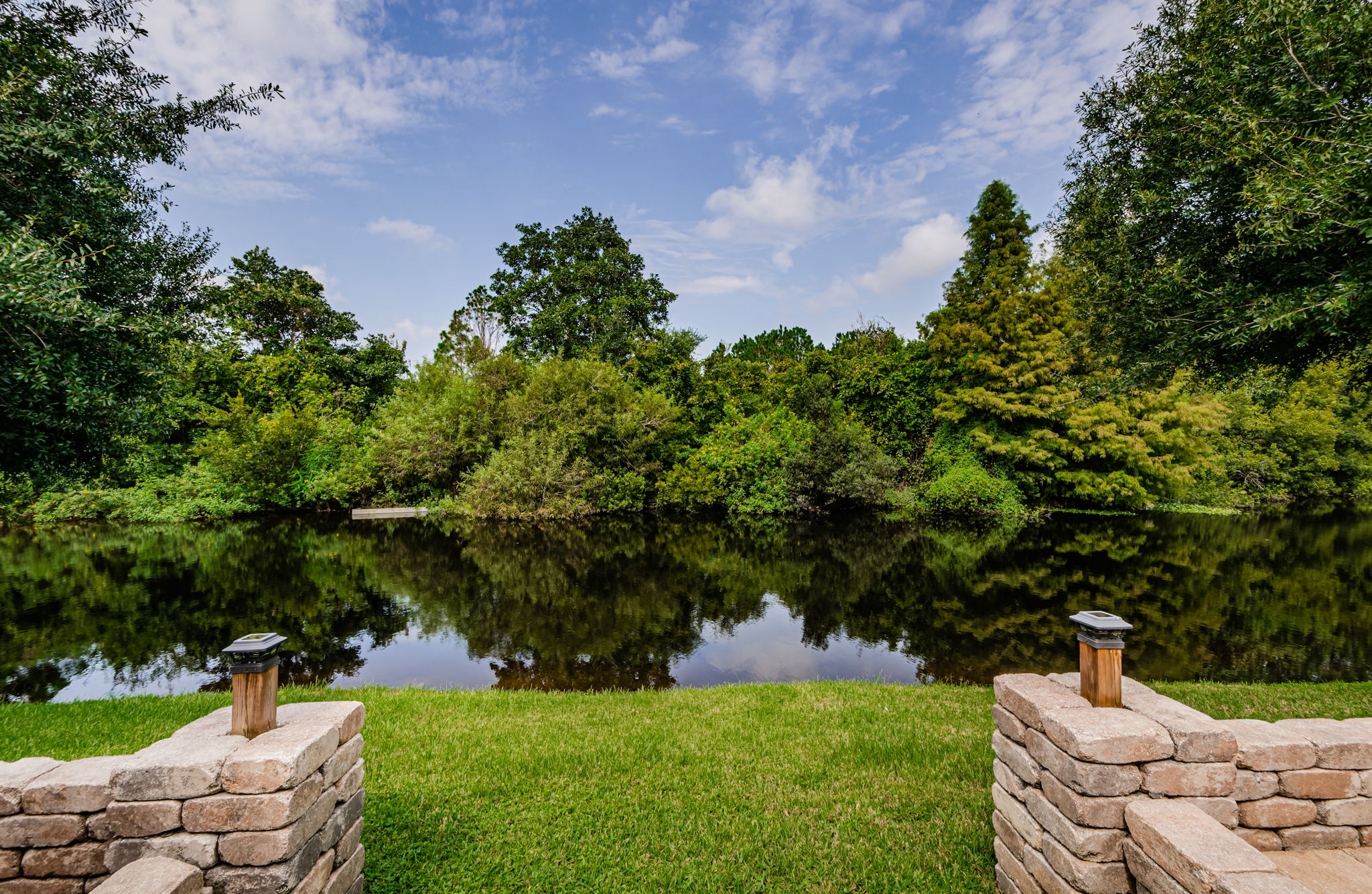 Backyard provides gorgeous sunset views overlooking pond