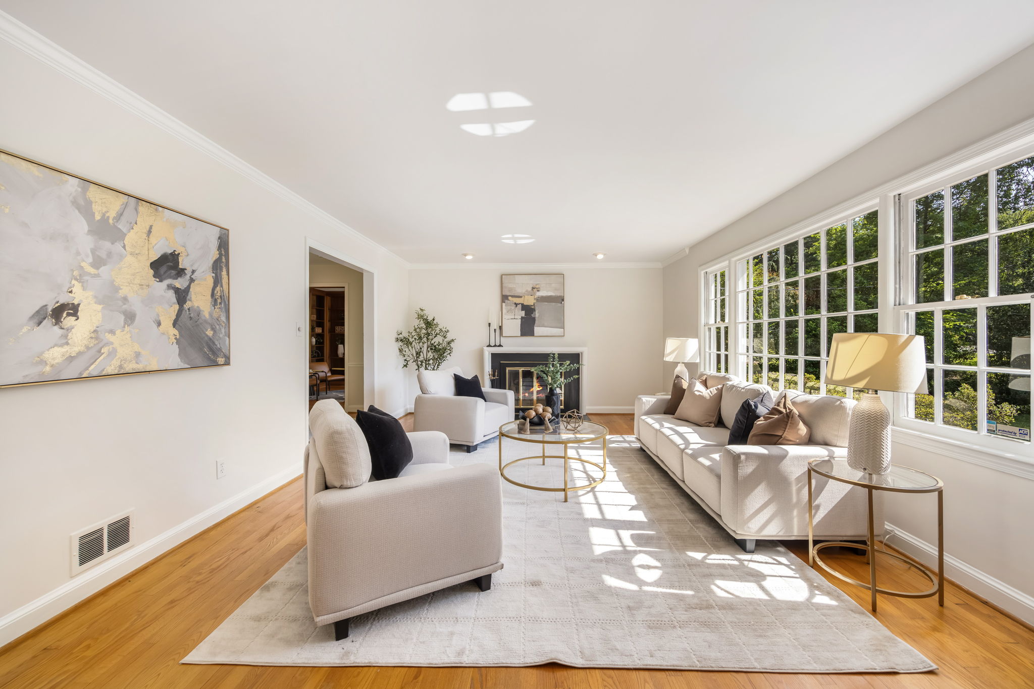 Living Room with Large Picture Window & Fireplace