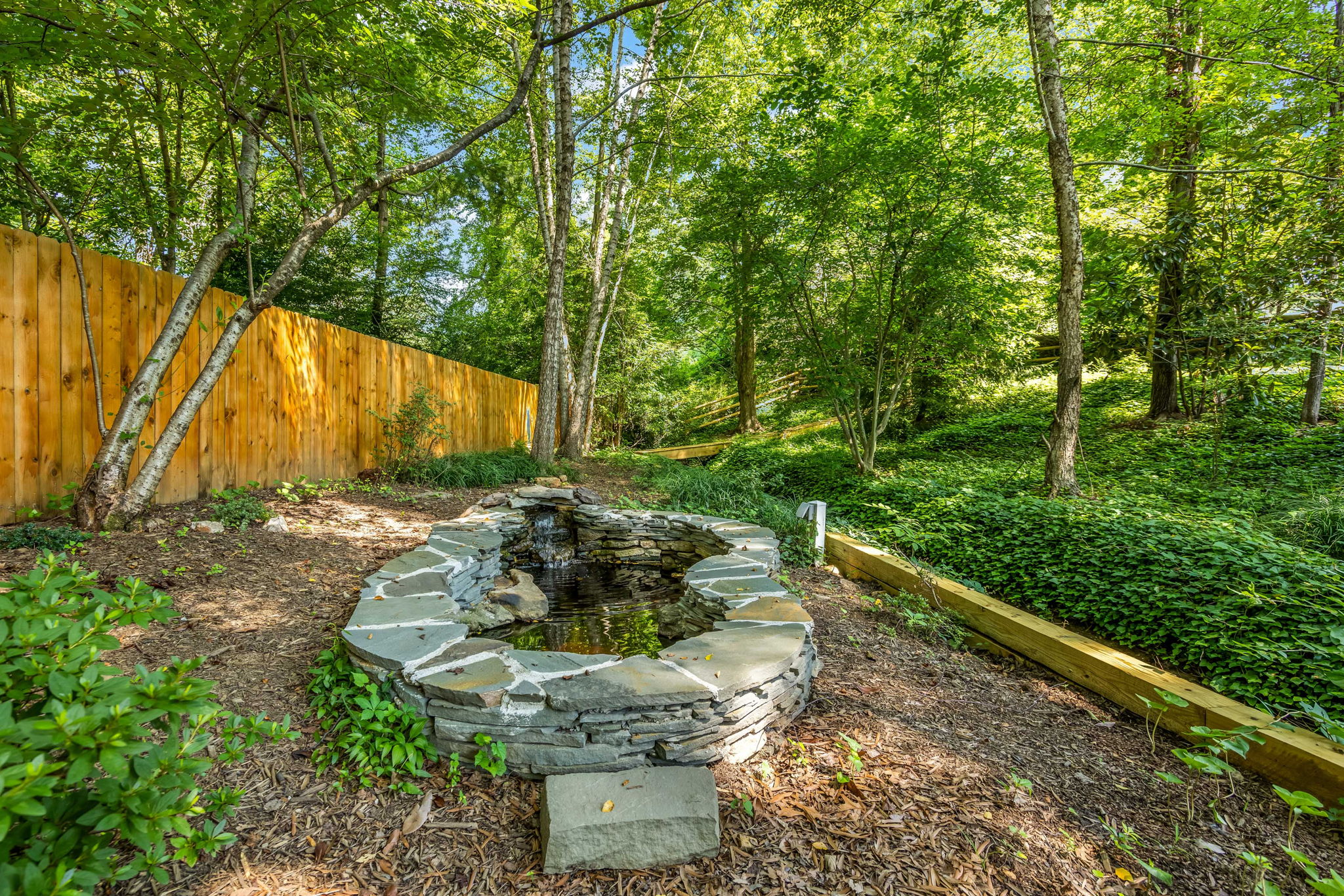 1/2-acre private lot with  gorgeous landscaping!