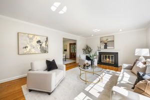 Living Room with Large Picture Window & Fireplace