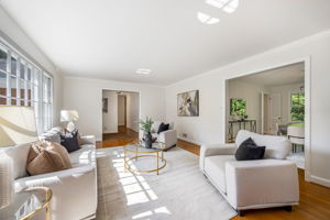 Living Room with Large Picture Window & Fireplace