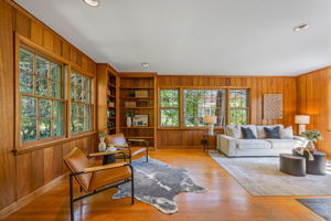 Main-level Family Room w fireplace & built-ins