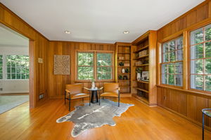 Main-level Family Room w/Fireplace & Built-Ins