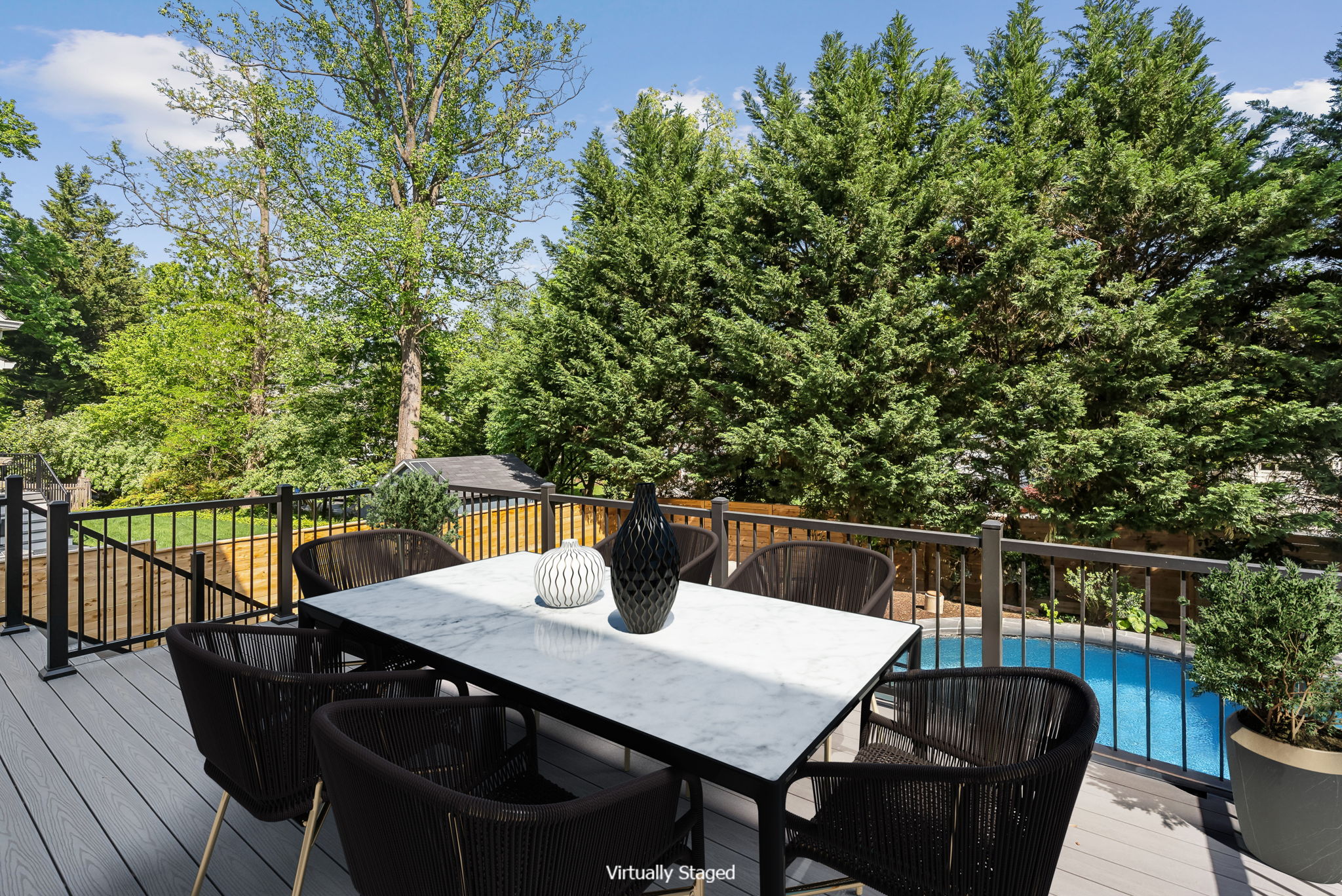 Rear Deck overlooking the Pool and Entertainment Area