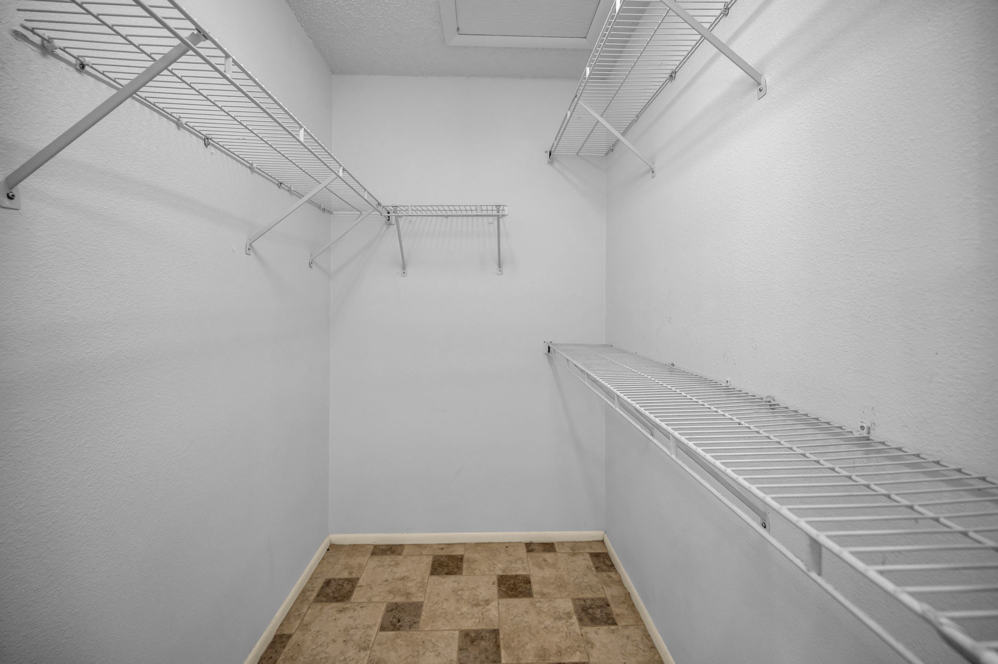 Primary Bedroom Walk-in Closet