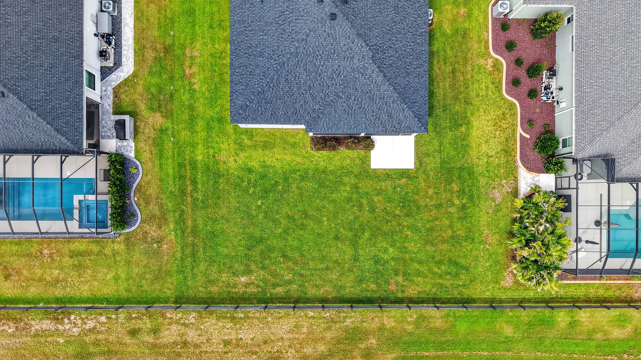 Aerial Rear Elevation with Spacious Rear Yard and ROOM FOR A POOL!