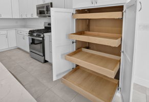 Kitchen with Built-In Double Pantry and Roll-Out Shelving