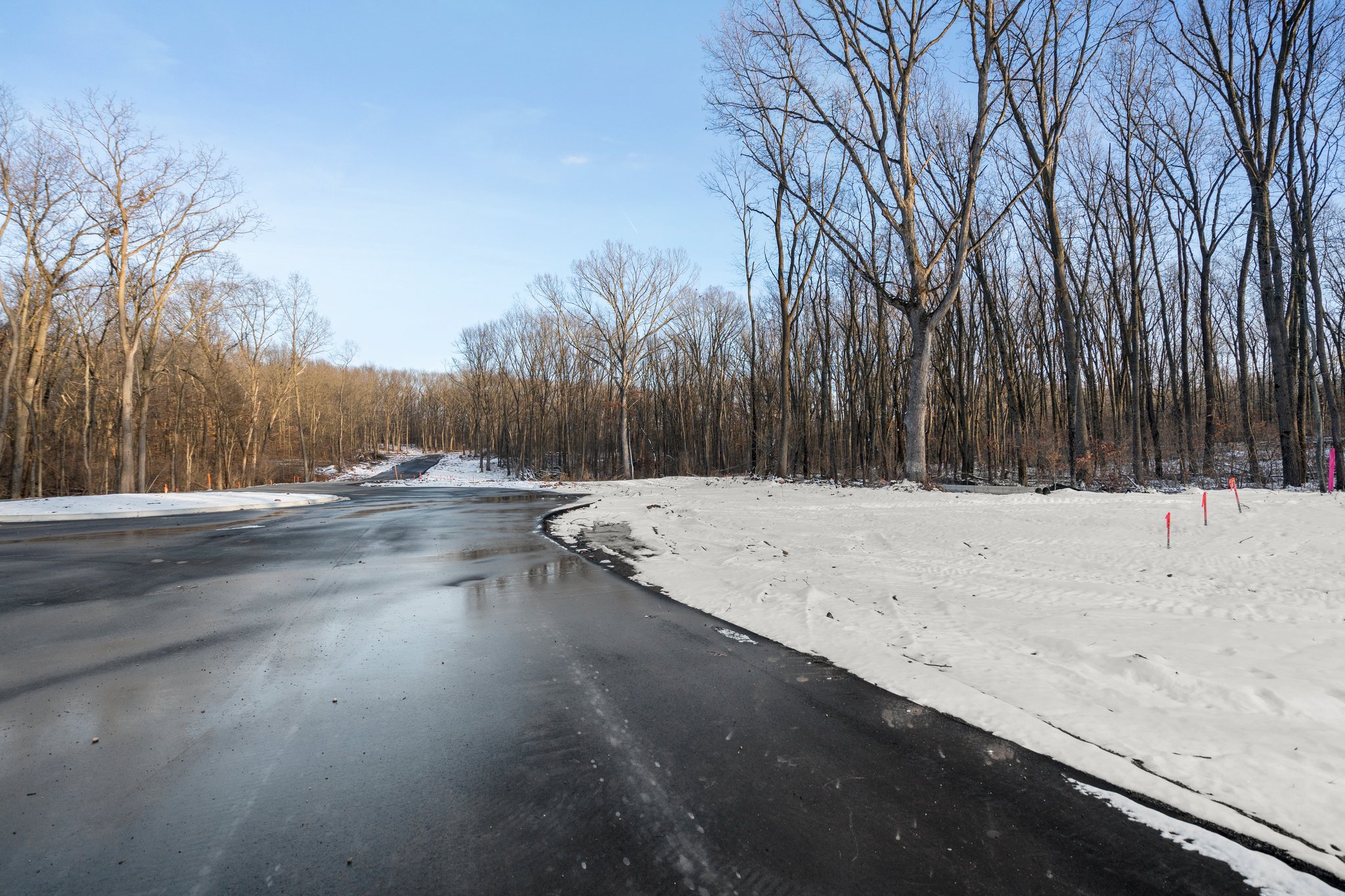 Paved, 2-lane access road