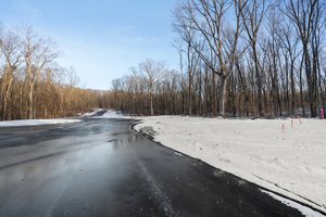 Paved, 2-lane access road