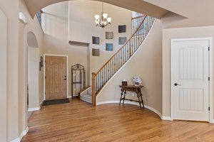 Foyer with curved staircase
