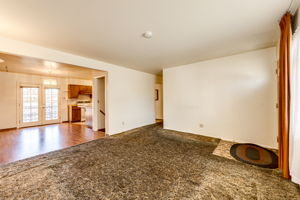 Living room looking into the kitchen area