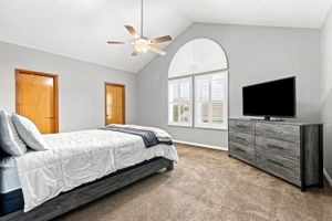 Primary Bedroom, high ceilings, ceiling fan.