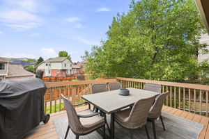 Family room leads out to the deck with wonderful views of foothills and golf course.