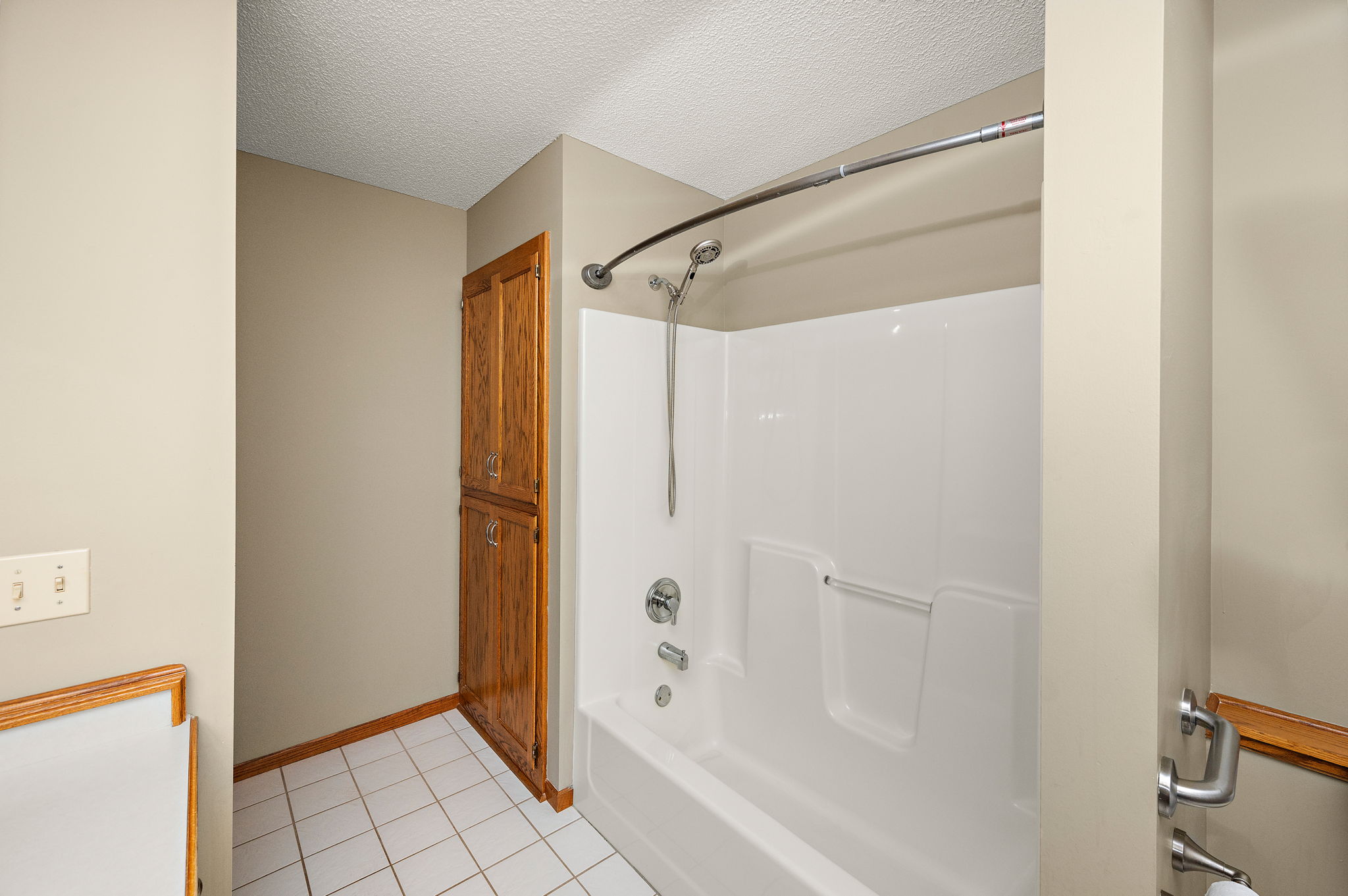 Private owners bathroom. Low maintenance one piece shower/tub surround.