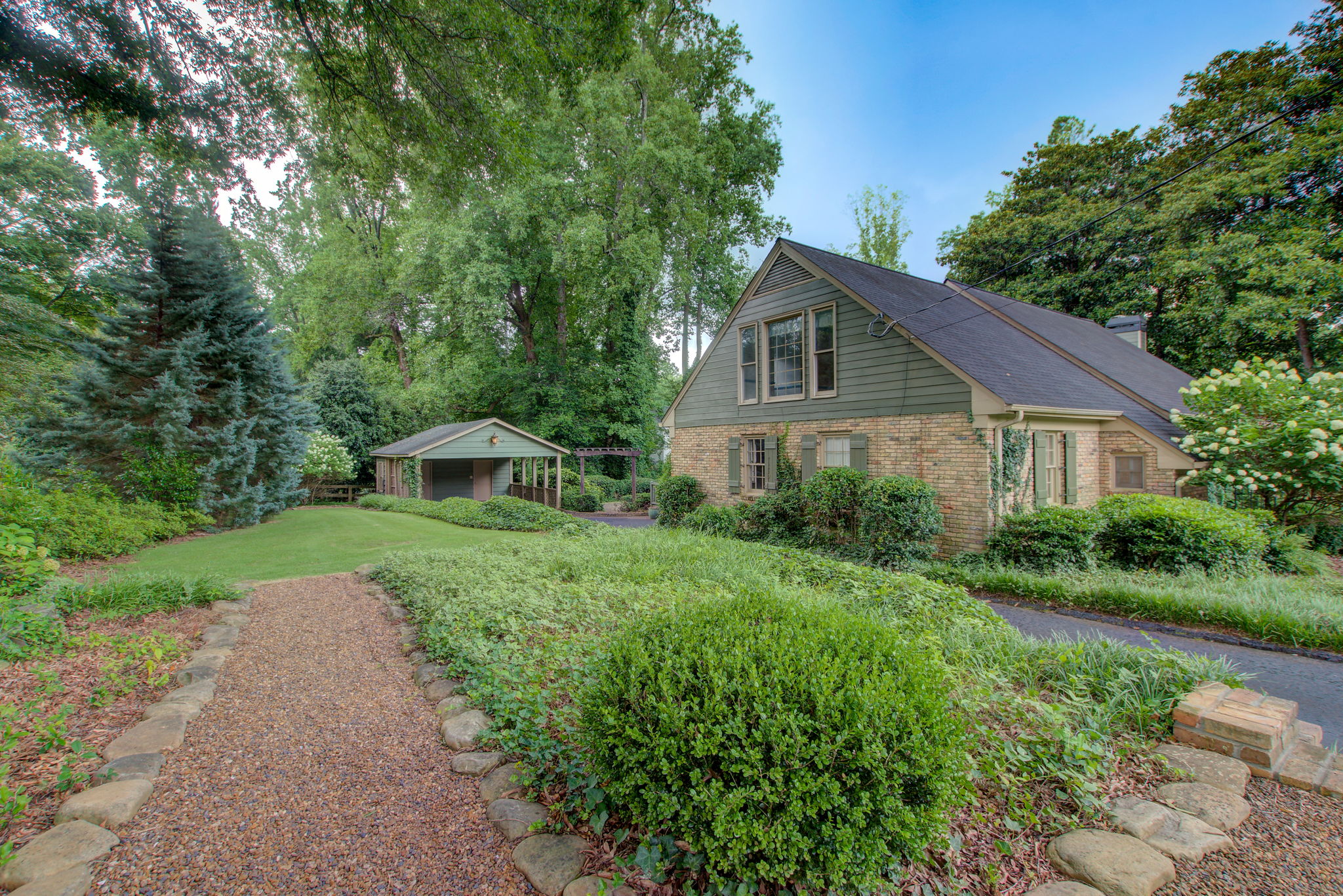 52 Exterior Side Yard w Carport + Side
