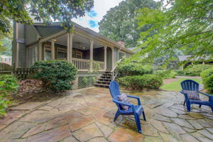 15 Exterior Side + Rear Partial w Deck + Patio