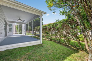 Rear/Side Yard with Lanai and Extended Birdcage