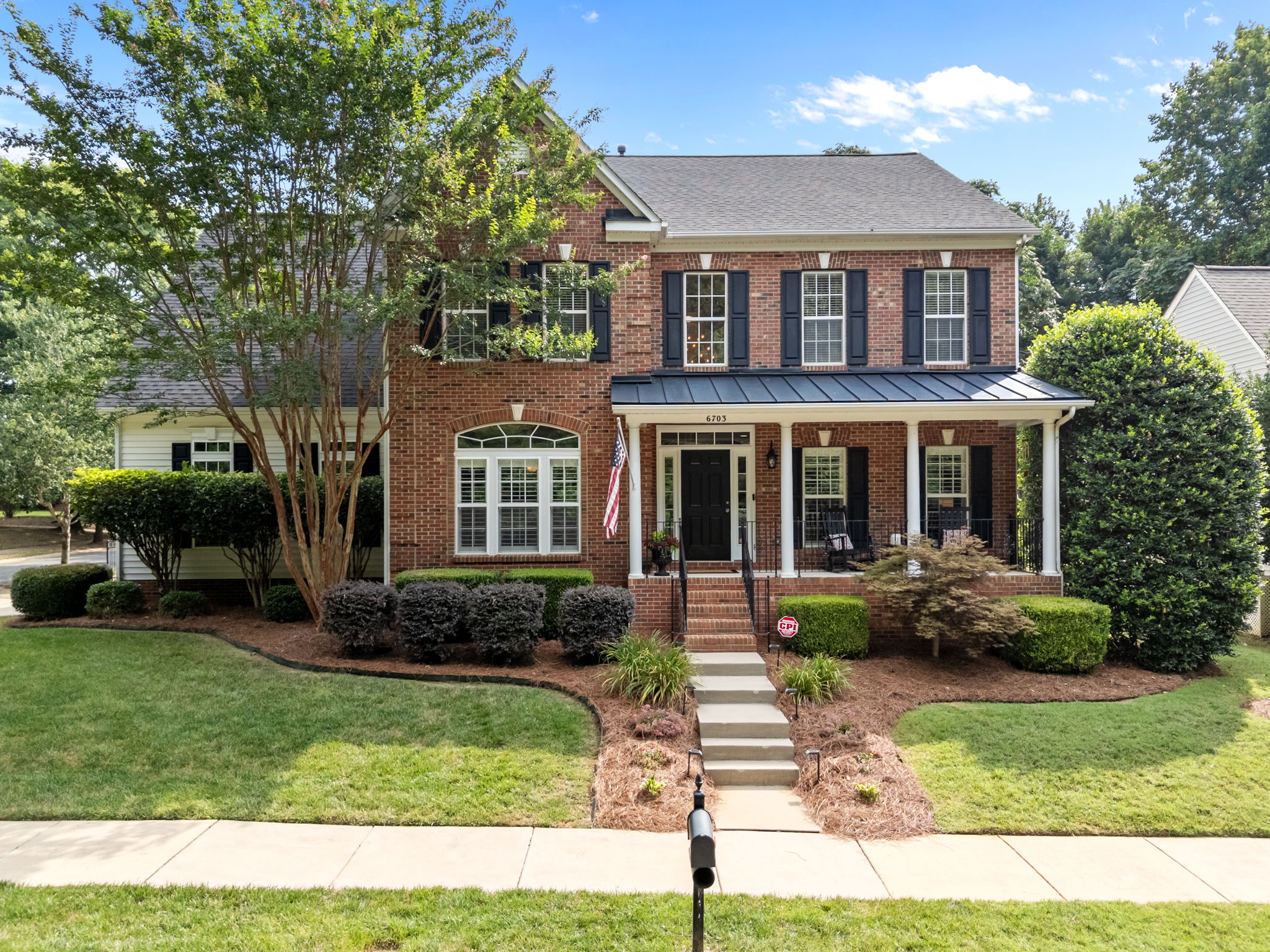 Low maintenance brick and vinyl siding