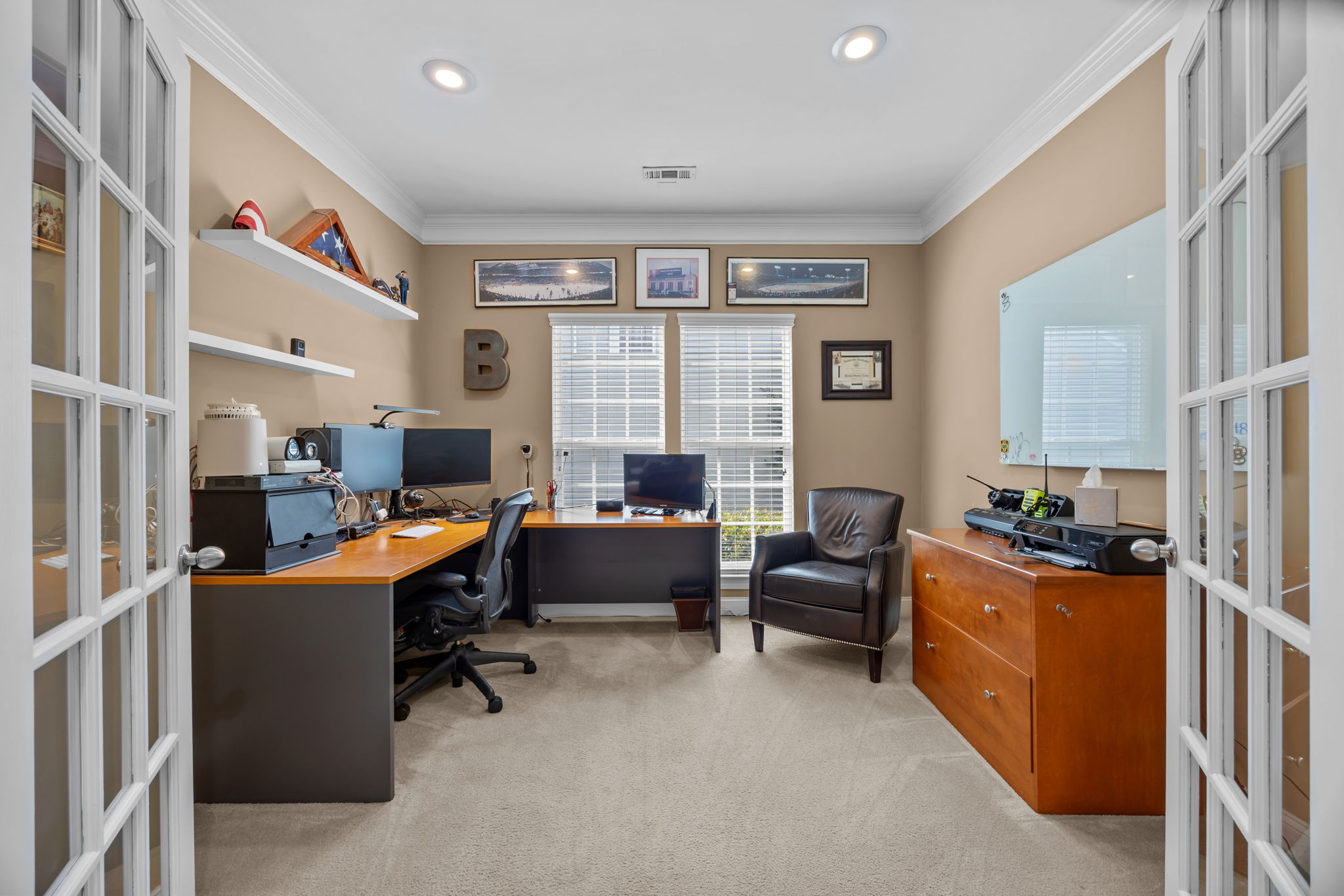 Office with French doors, recessed lighting and crown molding
