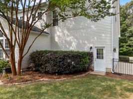 Service door to the 3 car garage