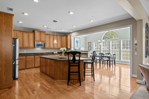 Wide open kitchen with enormous island and extra storage