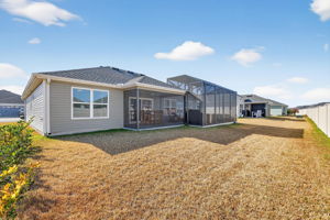 Large Rear Yard with Rear Privacy Wall and Room For a Pool!