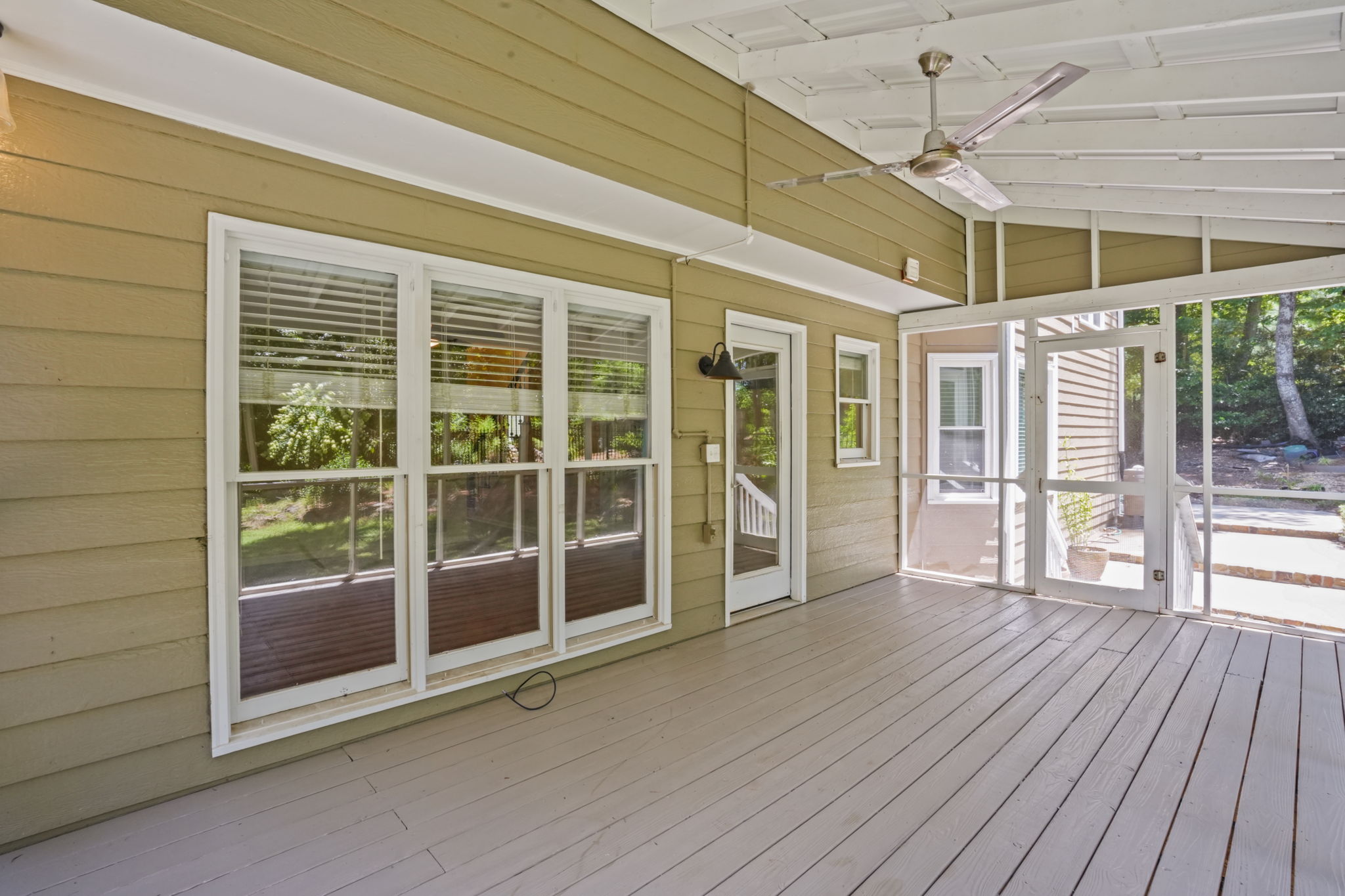 The screened porch flows easily with the family room and kitchen!