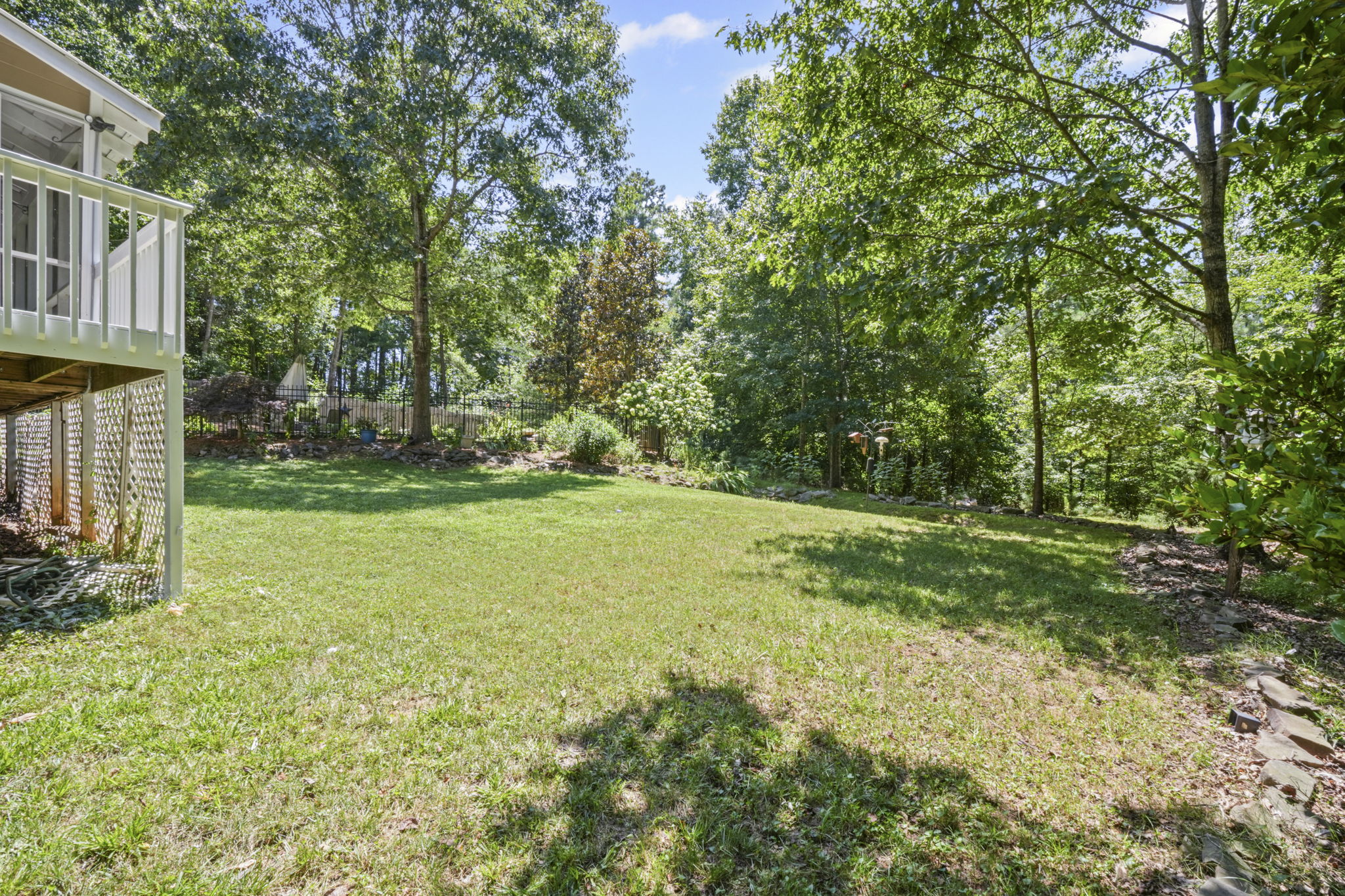 The backyard is wooded creating additional privacy!