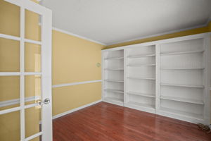 Office with french doors and built-in bookcases!