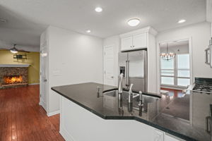 Kitchen has a breakfast bar perfect for additional seating!