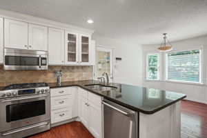 Bright and airy kitchen overlooking the backyard!