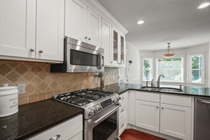 Updated cabinetry, stainless steel appliances with beautiful granite countertops!