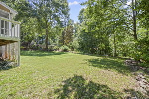 The backyard is wooded creating additional privacy!