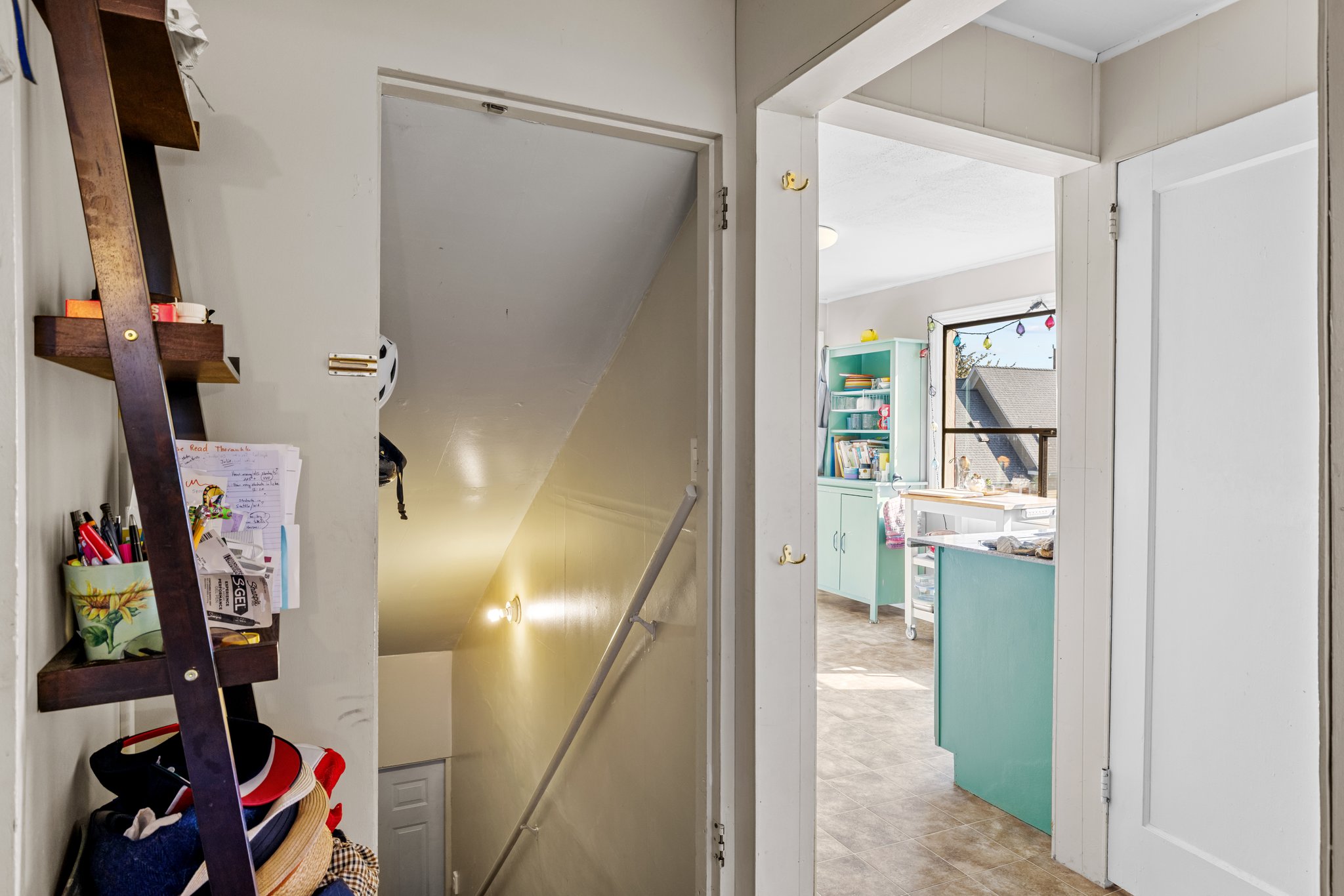 Upper: from hallway to stairs and kitchen/bath
