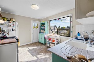 Upper: sunlit kitchen
