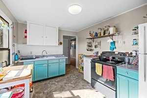 Upper: spacious kitchen