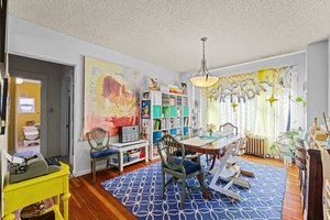 Main:  Dining room, large, beautiful wood floors and more!