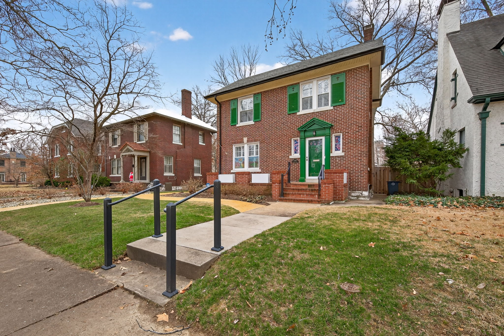 This handsome 1921 brick gem is nestled in the heart of University City, within walking distance of the Delmar Loop, Wash U, Maker's District, COCA, and Forest Park.