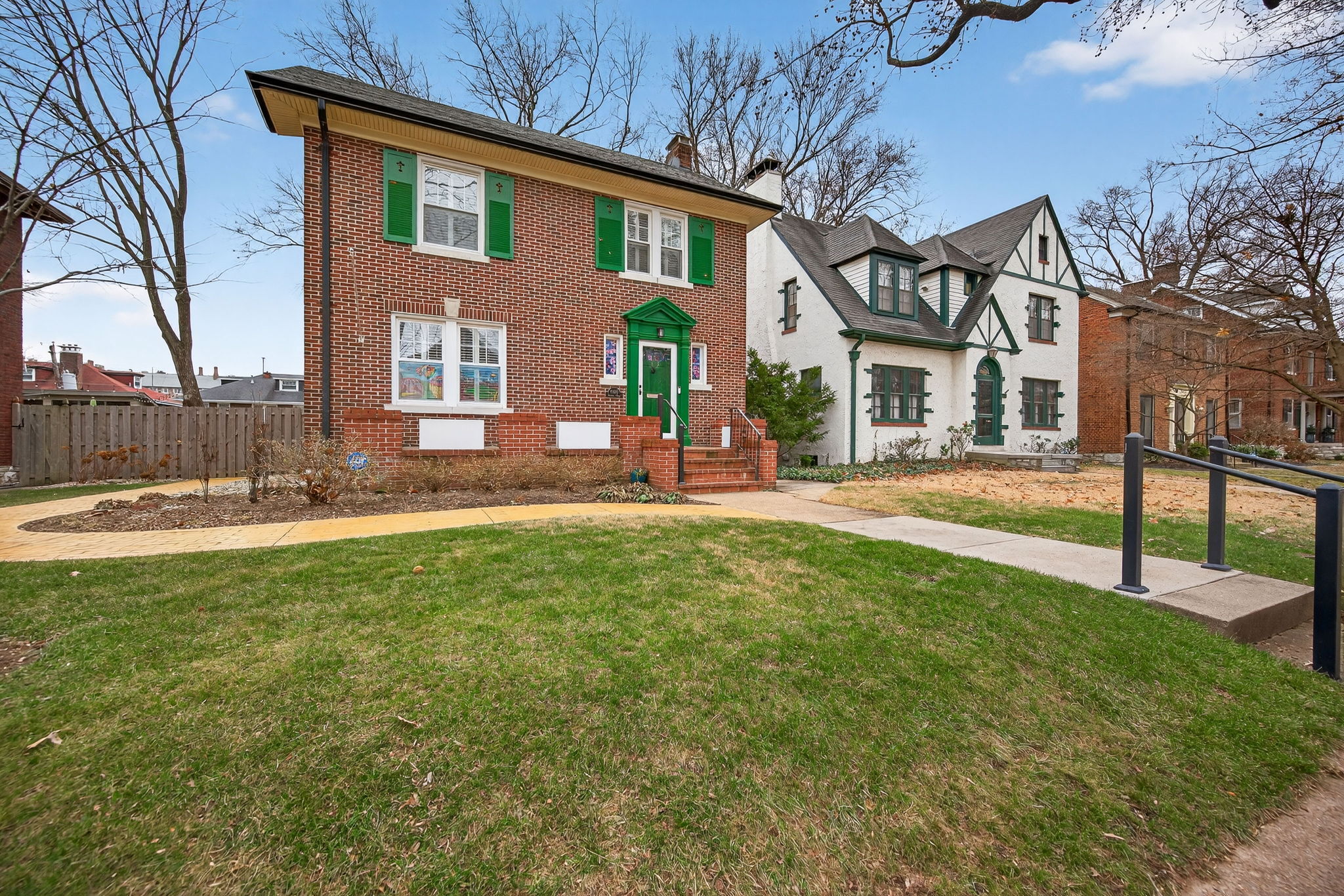 This home has been well-loved and it shows including the new custom brick-stamped concrete and custom handrails.